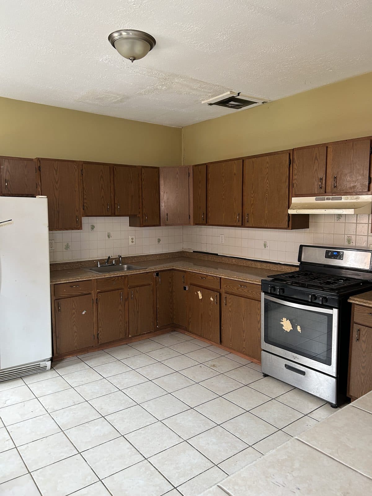 Kitchen before renovation — Shell Home Inspections 203k project