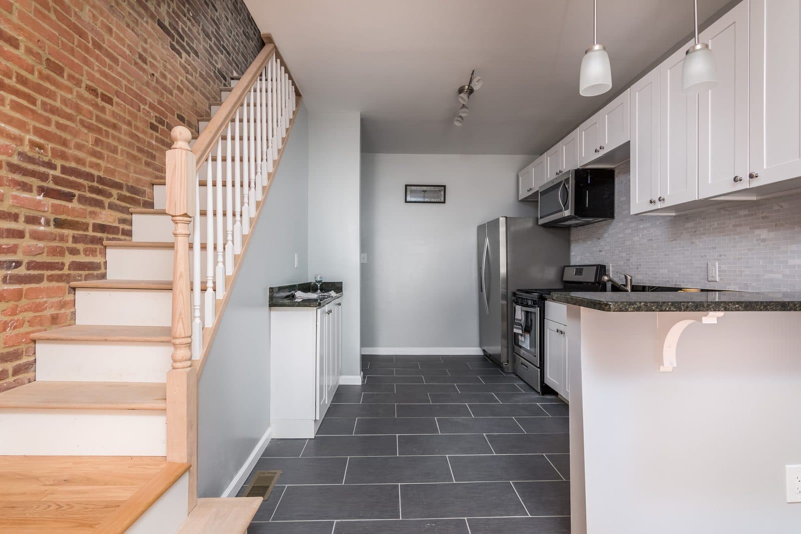 Staircase after renovation — Shell Home Inspections 203k project